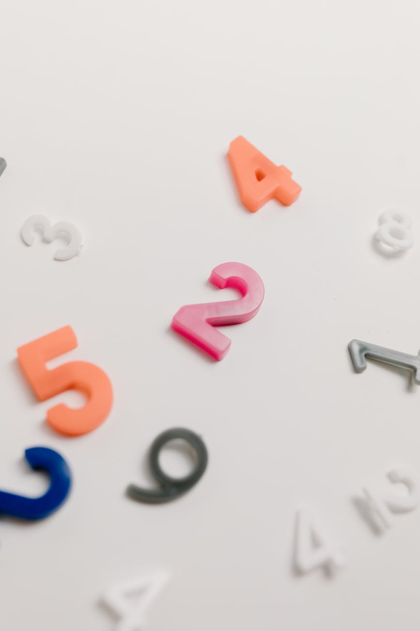 plastic numbers on white background
